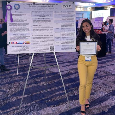 Daniela Sarmiento with NPEIV award-winning poster