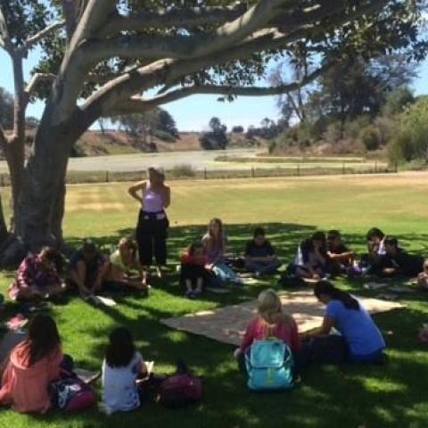 Young Writers Camp working outside