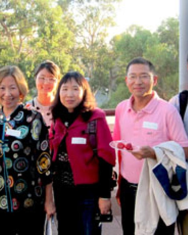 Faculty and international scholars at an event at the Gevirtz School 