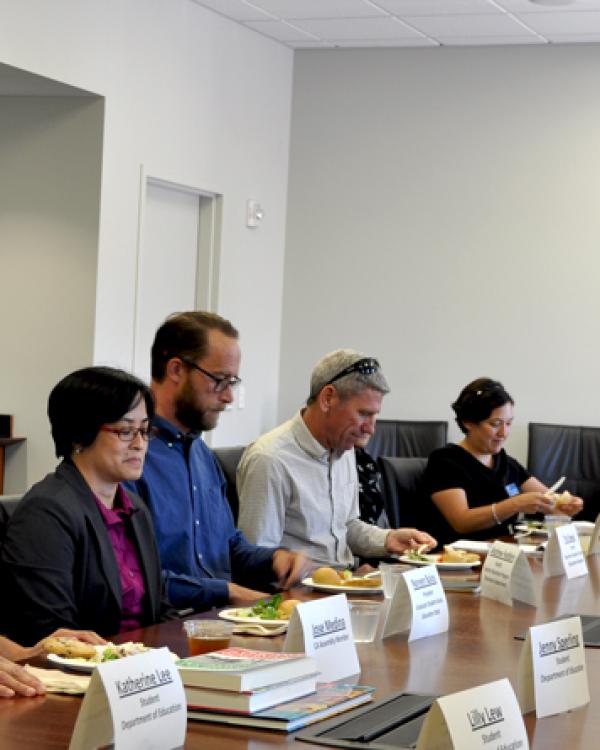 Jose Medina meets with the GGSE, including Dean Milem (right) 