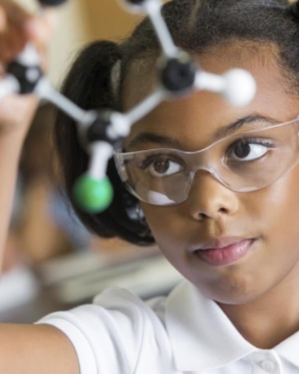 girl working on a STEM project 